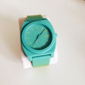 Men’s turquoise & yellow Nixon watch